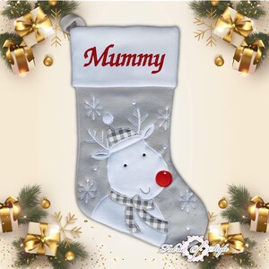 May include: A gray Christmas stocking with a white reindeer design and the word "Mummy" embroidered on the cuff.