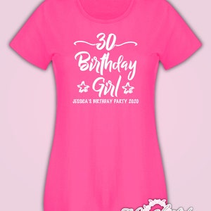 May include: Pink t-shirt with white text that says "30 Birthday Girl" with two stars on either side of the word "Girl". The text "Jessica's Birthday Party 2020" is below the main text.