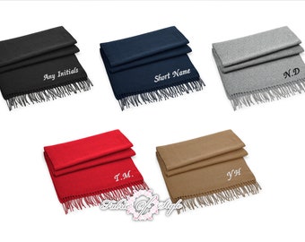May include: Five different colored scarves with fringe. Each scarf is folded in half and has white embroidered text. The text reads "Any Initials", "Short Name", "N.D", "T.M.", and "Y.H."