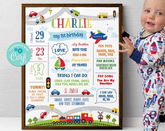 May include: A colorful printable first birthday milestone chart for a boy named Charlie. The chart features a road theme with cars, trucks, and a train. It includes details like height, weight, number of teeth, favorite toys, books, and songs. The chart also lists things the child can do, such as stand, clap, crawl, dance, and wave.