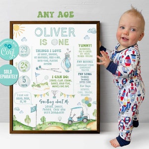 May include: A personalised printable chart for a one-year-old boy named Oliver. The chart features a golf theme with a green and white colour scheme. It includes details like his height, weight, favourite things, and a fun fact about him. The chart is framed in a brown wood frame.
