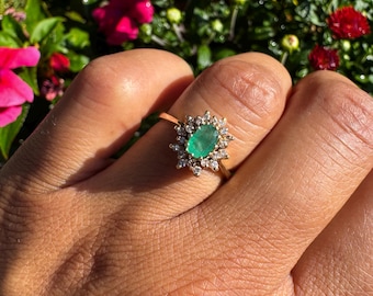 14K Oval Emerald Ring with Diamond Halo, 3.3 grams, Size 6.75. As is, chip on side of emerald.