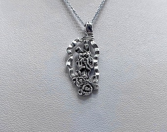 CORSE pendant the Virgin and child