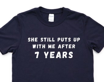 She Still Puts Up With Me After 7 years T-Shirt She Still Puts Up With Me After 7 years T-Shirt