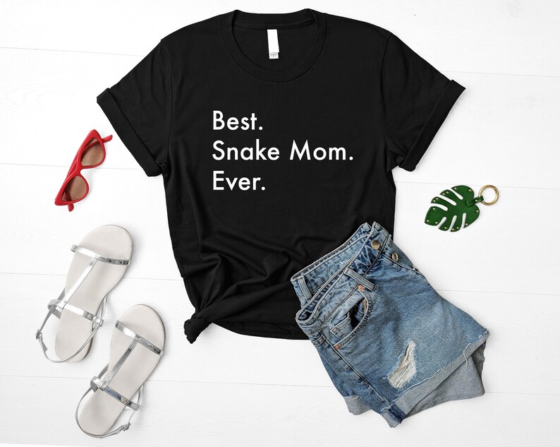 May include: Black t-shirt with white text that reads "Best. Snake Mom. Ever."
