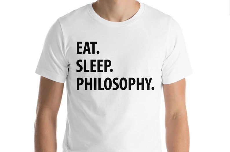 May include: White t-shirt with black text that reads "EAT. SLEEP. PHILOSOPHY."