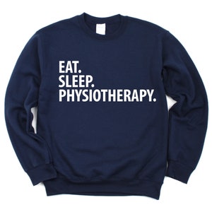 May include: A navy blue sweatshirt with the text "EAT. SLEEP. PHYSIOTHERAPY." printed in white.