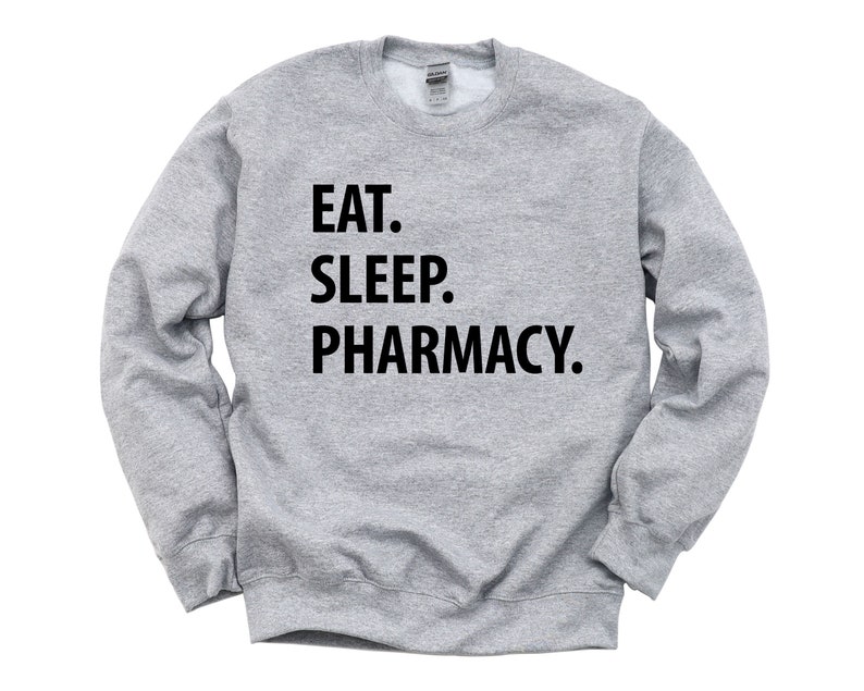 May include: A gray sweatshirt with the text "EAT. SLEEP. PHARMACY." printed in black.