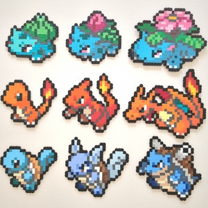 May include: A collection of nine pixel art Pokemon characters made with perler beads. The characters include Bulbasaur, Ivysaur, Venusaur, Charmander, Charmeleon, Charizard, Squirtle, Wartortle, and Blastoise.