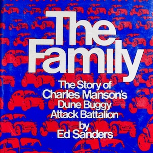 May include: A hardcover book titled The Family: The Story of Charles Manson's Dune Buggy Attack Battalion by Ed Sanders. The cover features a repeating pattern of red dune buggy silhouettes against a vibrant blue background with white text.