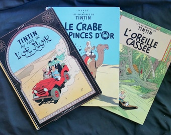 Les Aventures de Tintin: Les Crabe aux Pinces D'Or, L'Orielle Cassée Tintin au Pays de L'or Noir (1949, 1963) by Hergé. Hardcovers in French