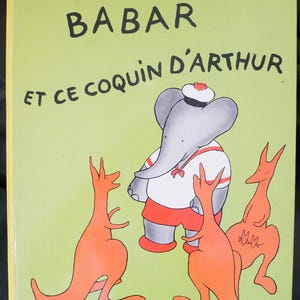 Babar et ce Coquin D&#39;Arthur (1965) de Laurent de Brunhoff: Babar y su primo en una aventura vacacional. Sin marcar, en buen estado.