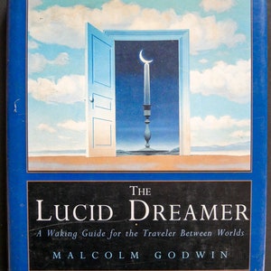 The Lucid Dreamer (1994) A Waking Guide for the Traveler Between Worlds by MAlcolm Godwin - First edition HC/DJ near fine.