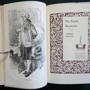 May include: A black and white illustration of Louis XVI, the King of France during the French Revolution. The image is from a book titled "The French Revolution" by Thomas Carlyle, published by H.M. Caldwell Company, New York.