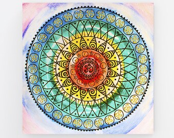 May include: A colorful mandala with intricate details painted in watercolor on a canvas. The mandala features a circular design with concentric circles, geometric patterns, and floral motifs. The colors used are blue, green, yellow, orange, and red.