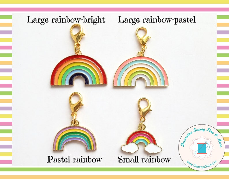 May include: Four rainbow-themed charms with gold-colored clasps. The charms are in various sizes and color schemes, including bright and pastel rainbows. Text on the image reads "Large rainbow-bright", "Large rainbow-pastel", "Pastel rainbow", and "Small rainbow".