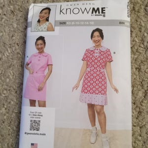May include: A sewing pattern package featuring two dress designs. The package includes a photo of a woman wearing each dress. The package has the text "GWEN HENG knowME by mimiG" and "SIZE K5 (8-10-12-14-16)". The package also has a QR code and the text "@gwenstella.made".