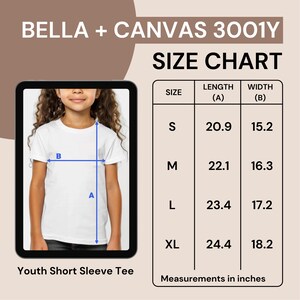 May include: Size chart for Bella + Canvas 3001Y youth short sleeve tee. The chart shows measurements in inches for sizes S, M, L, and XL. The measurements include length and width.