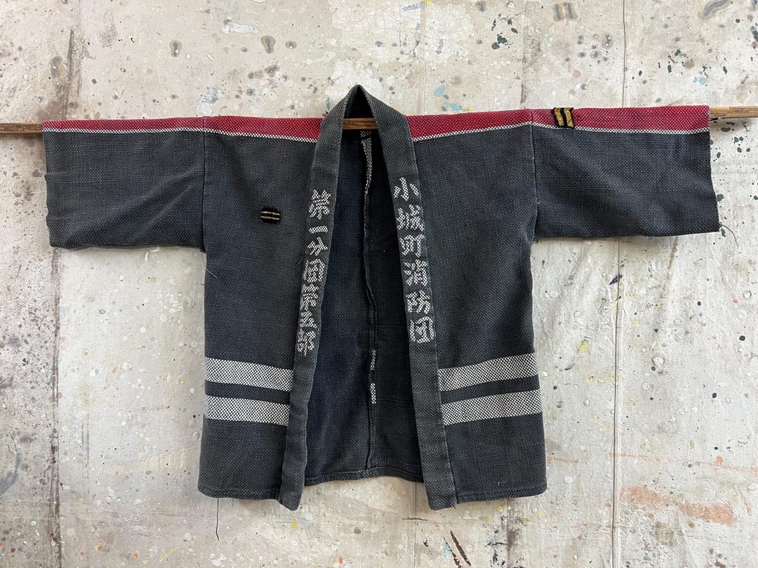 ヴィンテージの日本製、素敵な色褪せ刺し子生地の消防士半纏ジャケット