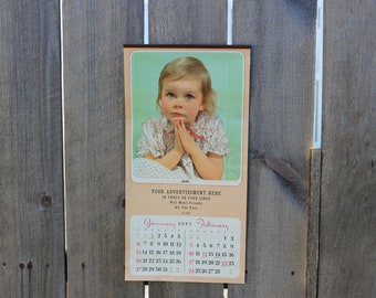 1957 Children's Faces Calendar