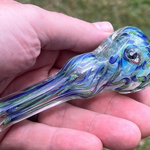 Deadhead Themed brilliantly colored Inside Out Glass Pipe  Spoon with Custom Space Yoir Face on a Bed of Roses Millefiori