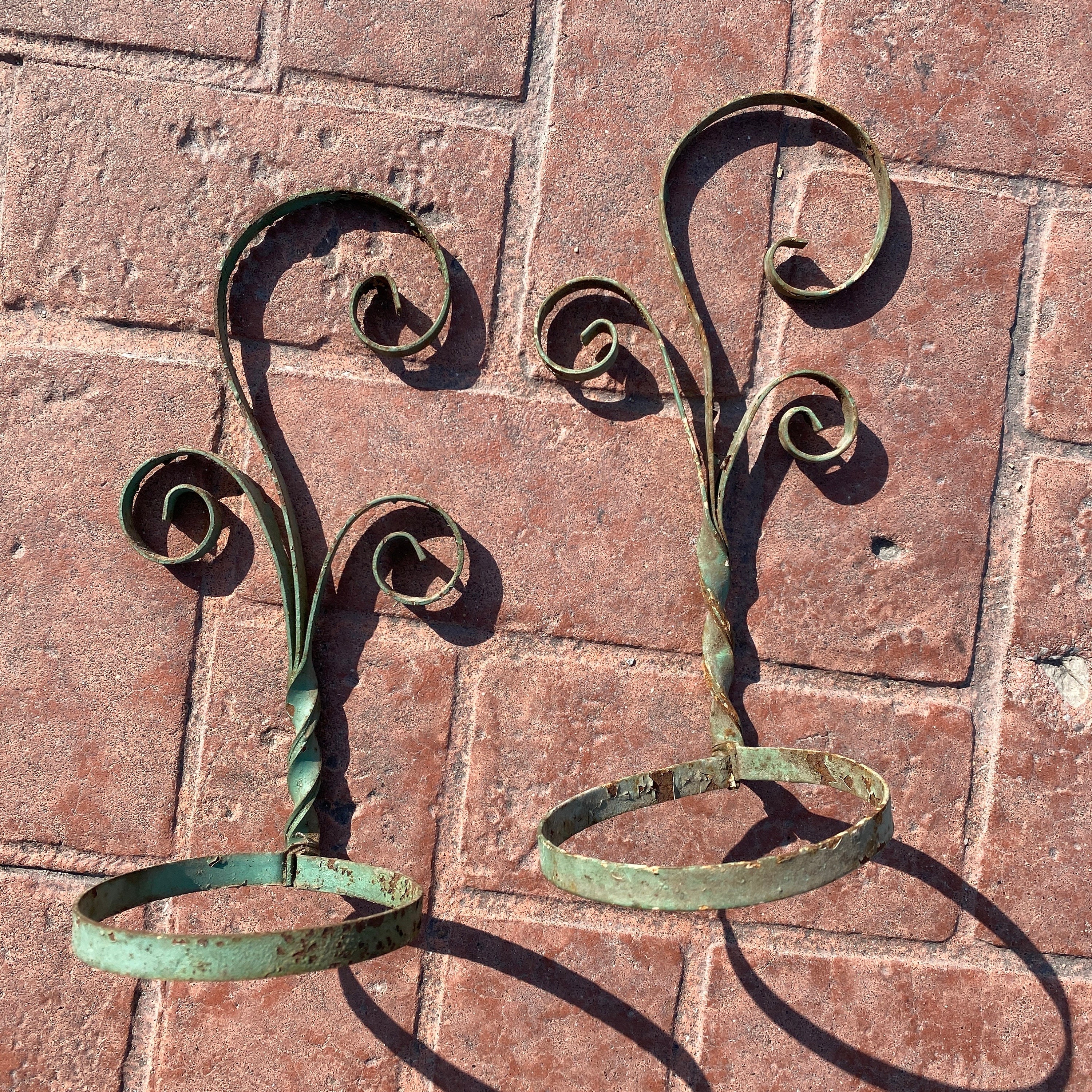 Wrought iron wall plant holders deals