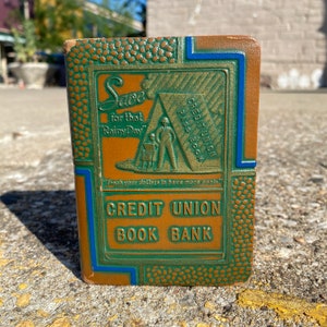 Vintage book bank with great advertising for credit union