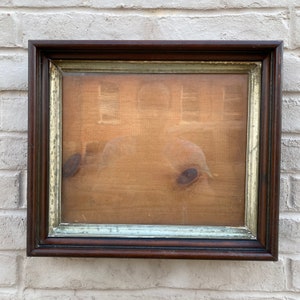 Antique 10x12 Victorian frame with walnut and ebony finish and gilt liner bubble glass