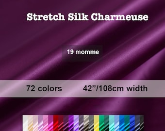 May include: Stretch silk charmeuse fabric in a deep purple color. The fabric is 42 inches wide and comes in 72 colors. The text "19 momme" is visible on the fabric.