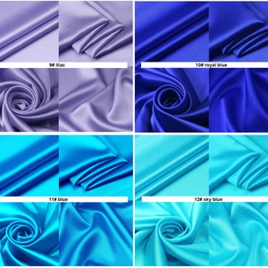 May include: Four swatches of satin fabric in different shades of blue and purple. The swatches are arranged in a grid pattern. The top left swatch is lilac, the top right swatch is royal blue, the bottom left swatch is blue, and the bottom right swatch is sky blue. Each swatch has a label with the color name and number.