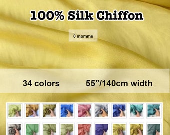 以下が含まれることがあります： 「100% Silk Chiffon」の文字と「8 momme」、「34色」、幅140cmの黄色い100%シルクシフォン生地。画像には、さまざまな色の見本が表示されています。