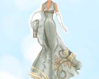 May include: A woman in a silver gown with a white fur stole and a beaded embellishment on the skirt. She is wearing white gloves and a hat.