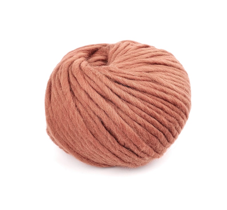 May include: A ball of brown yarn, ideal for knitting or crocheting.