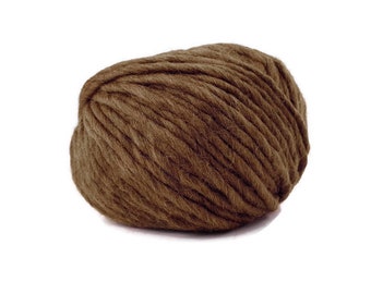 May include: A ball of brown yarn.