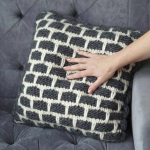Hypoallergenic merino wool pillow for nursery decor. Soft handmade knit cushion safe for sensitive skin and baby room