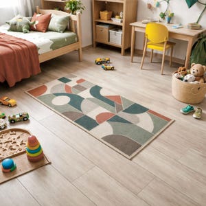 An mbroidered wool rug in a children's room.
