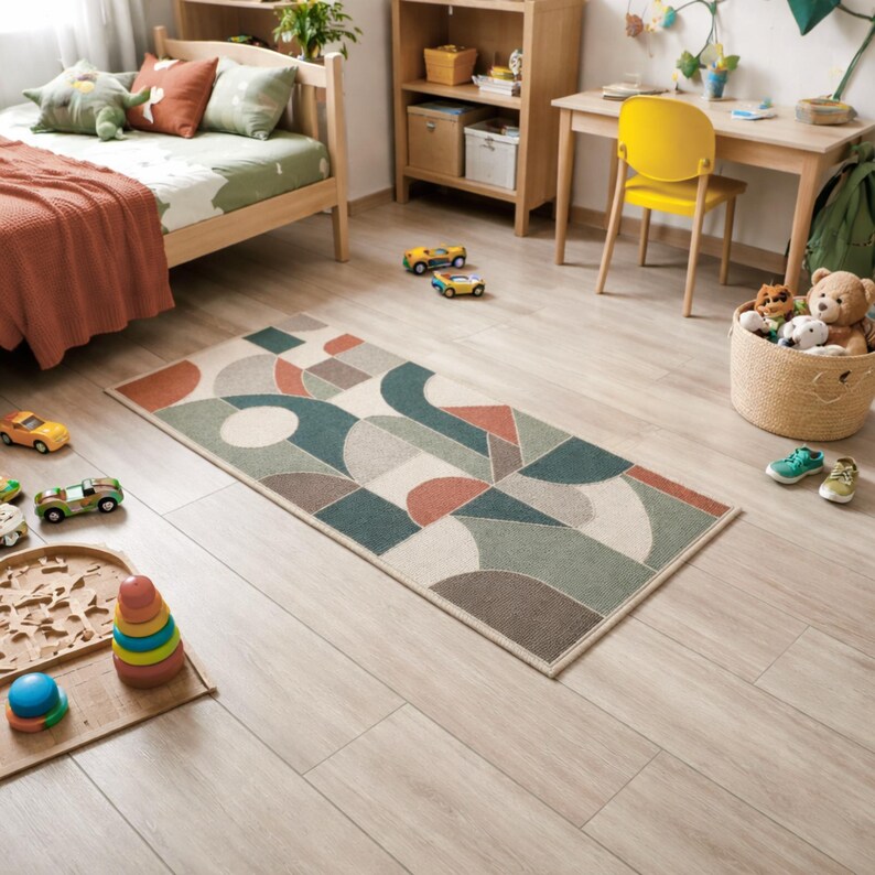 An mbroidered wool rug in a children's room.