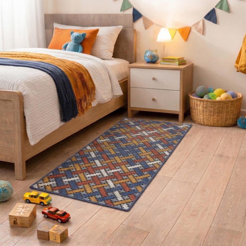 Colored geometric lines wool rug in a child's room nex to a wooden bed.