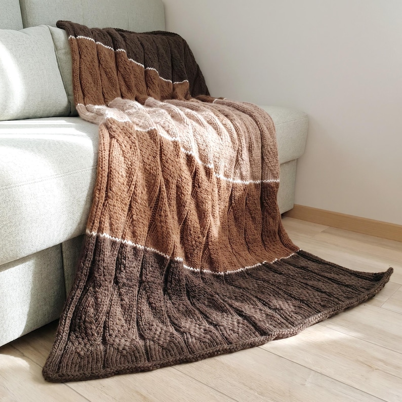 Knitted Striped Merino Wool Throw Blanket Brown Beige on a sofa