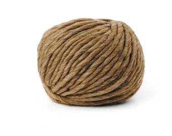 May include: A ball of brown yarn, perfect for knitting or crocheting.
