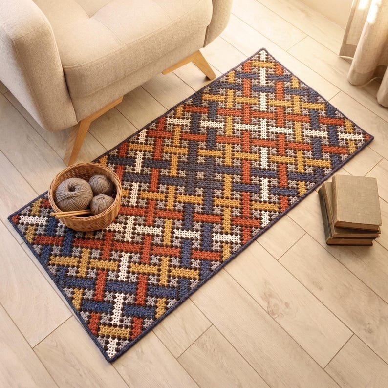Chair accent color rug in a warm living room. Geometric lines pattern rug.