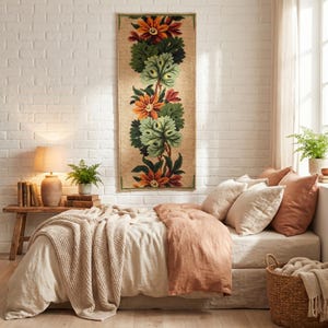Embroidery panel with wool threads forming flowers and leaves, textured wall decor for a bedroom in farmhouse style.