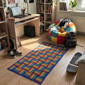 Handmade wool rug with bold color pattern in a teenager’s room, adding contrast and defining the space