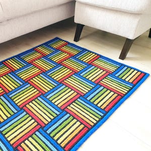 Modern rainbow geometric pattern rug for mid-century or boho interior style