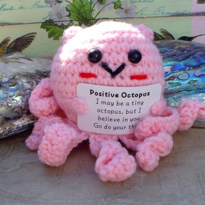 Crocheted Octopus: Handmade Plush with Positivity Sign