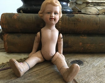 Former articulated doll.