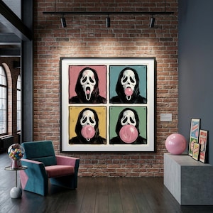 May include: A framed artwork depicting the Ghostface mask from the Scream films in four panels. Each panel has a different background colour: pink, blue, yellow, and green. The artwork is displayed in a room with a brick wall and modern furniture.