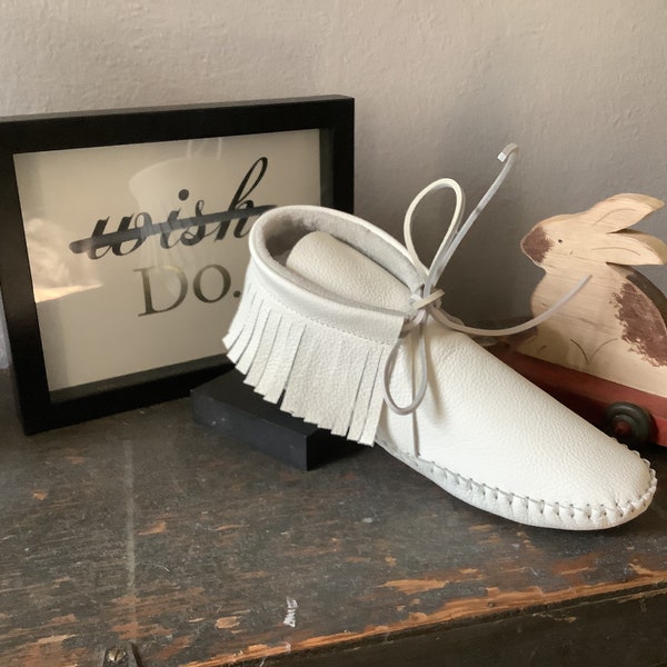 Inspired by a fusion of Native American and western cultures, these handcrafted moccasins are made completely of leather