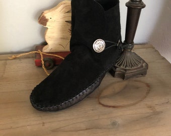 Inspired by a fusion of Native American and western cultures, these handcrafted moccasins are made completely of leather