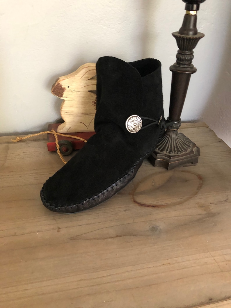Inspired by a fusion of Native American and western cultures, these handcrafted moccasins are made completely of leather
